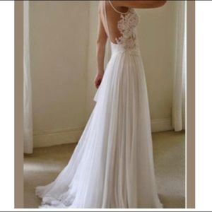 Ivory wedding dress- new, never worn size 2